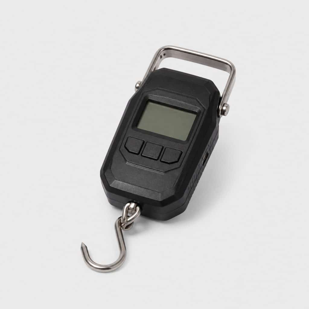 Balance électronique portable avec crochet et port USB sur fond clair
